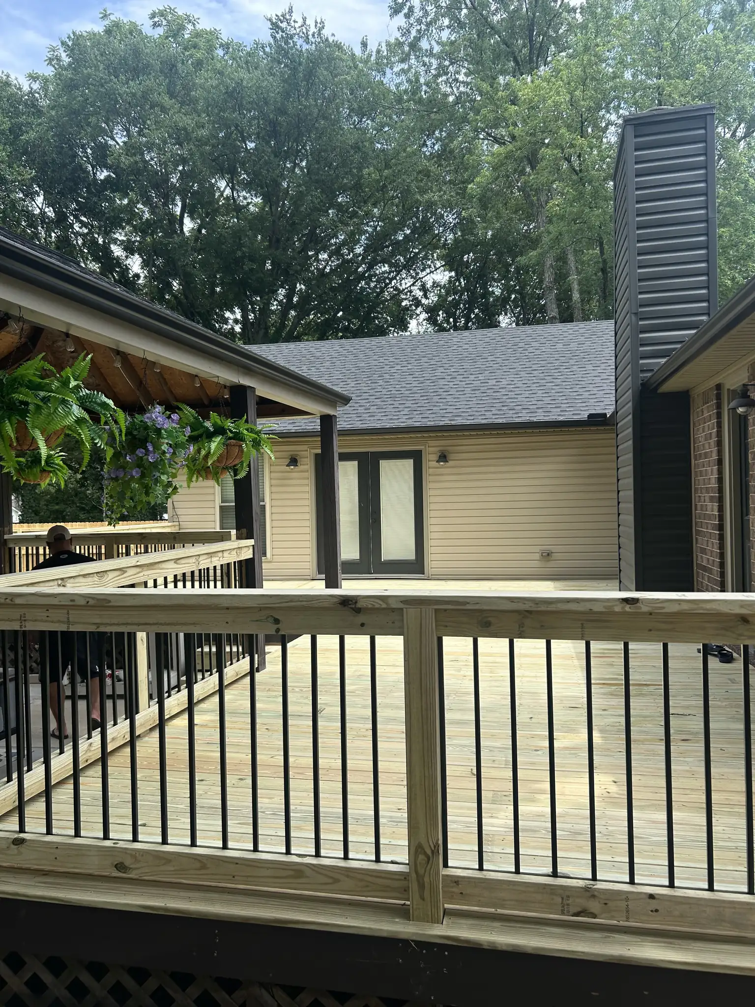 Large finished deck with black metal railing in Nashville, Tennessee