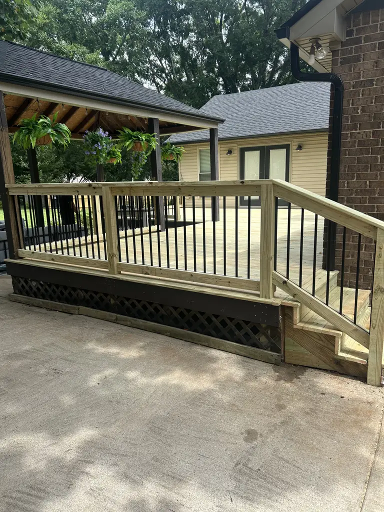 Covered deck with railing and a ramp built in Nashville, Tennessee