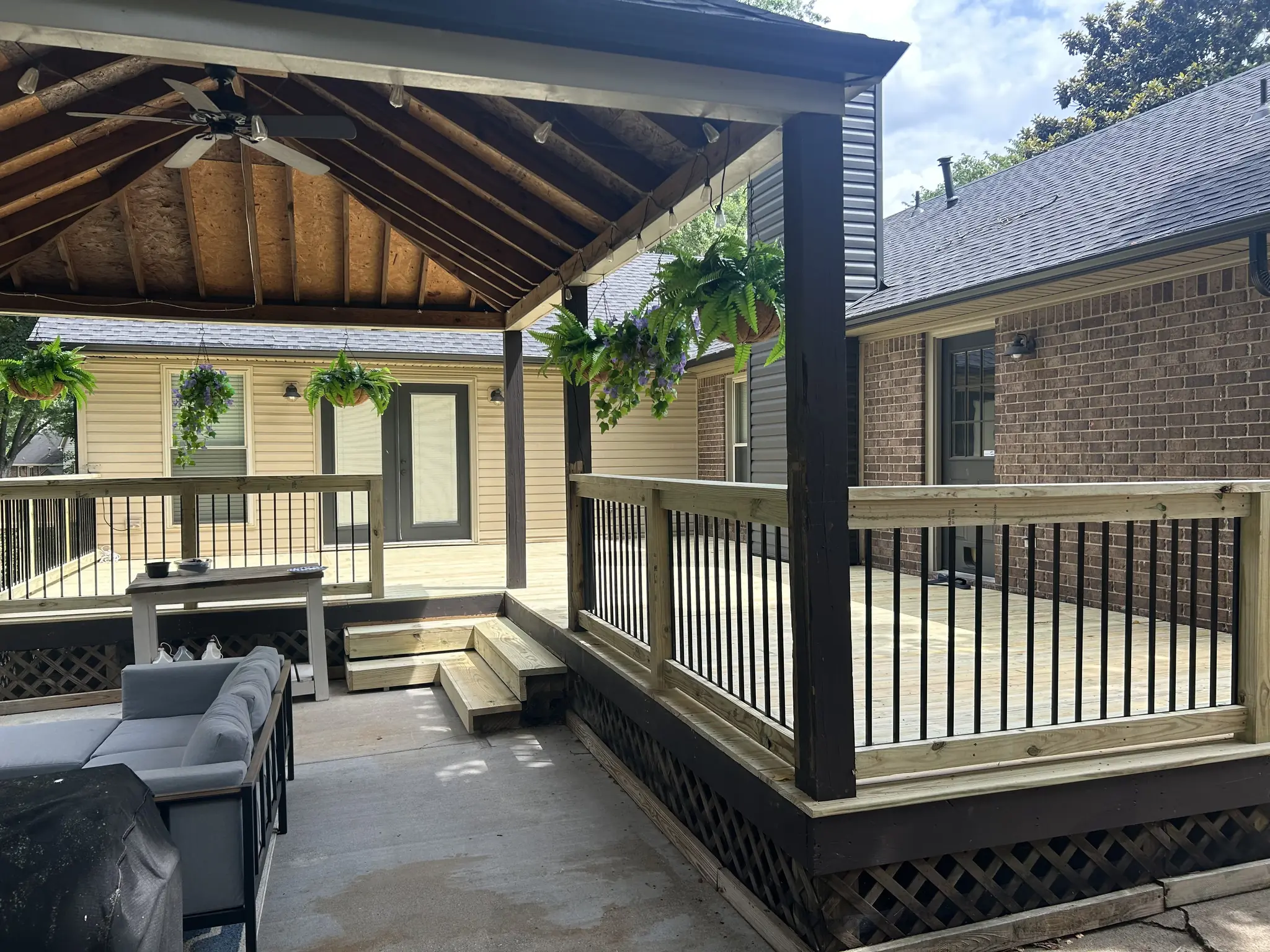 Covered patio with a timber gable roof in Nashville, Tennessee