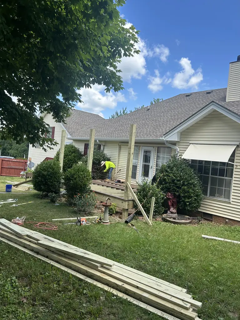 Crew framing a patio cover in a Nashville, Tennessee backyard