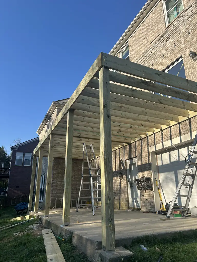 Large patio cover being framed at a brick home in Nashville, Tennessee