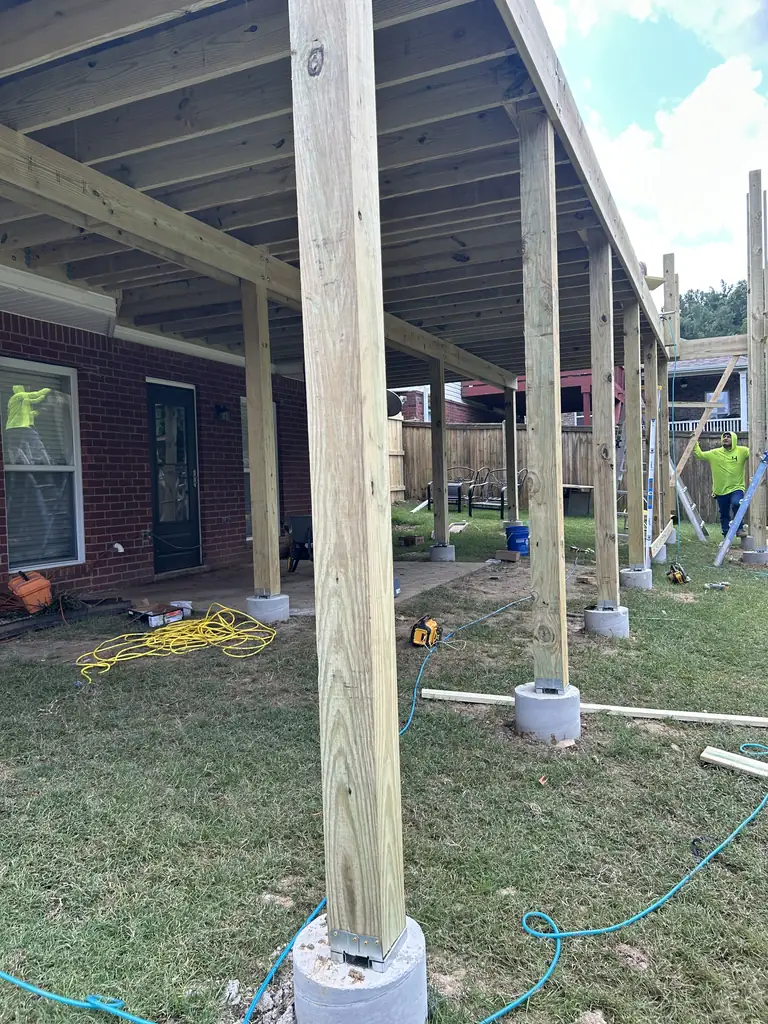 Patio cover posts set on footings before the roof goes on, Nashville, Tennessee